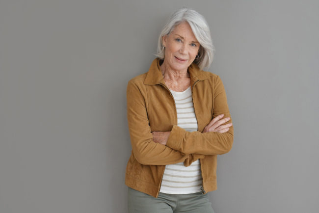 Modern,Senior,Woman,Smiling,On,Isolated,Grey,Background